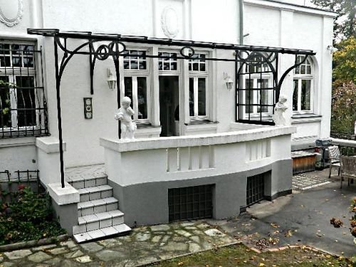 Alte Hammerschmiede Kunstschmiede: Schweres handgeschmiedetes Vordach, Jugendstil