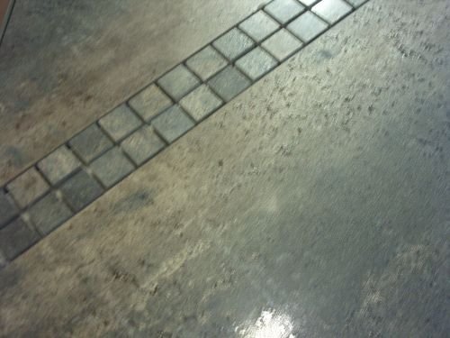 Schmidt-Bauleistungen: Boden mit Mosaikeinlagen