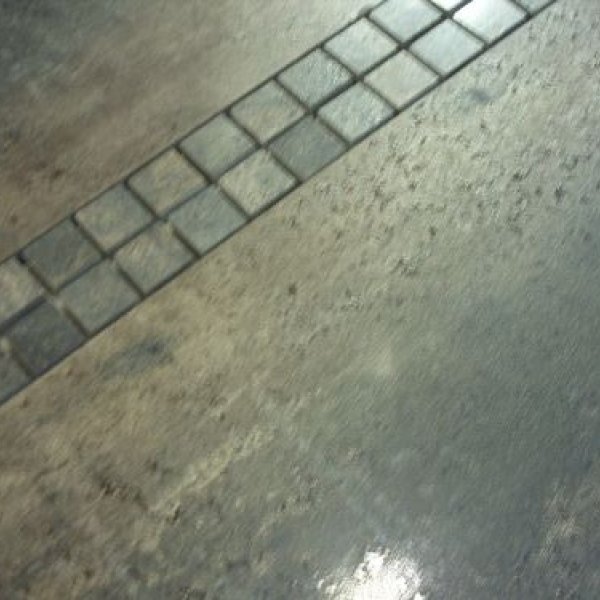 Schmidt-Bauleistungen: Boden mit Mosaikeinlagen